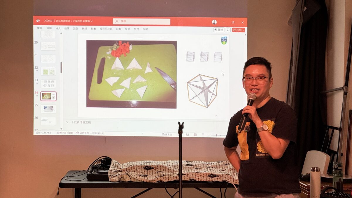 Photo of Sharkie Lin speaking against a presentation slide of tofu pieces cut in 3 D geometric shapes, and diagram of the Vedic Cube